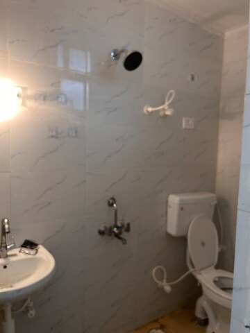 Bathroom in 2 BHK Apartment at Trehan Delight Residence, Alwar Bypass Road – for Rent