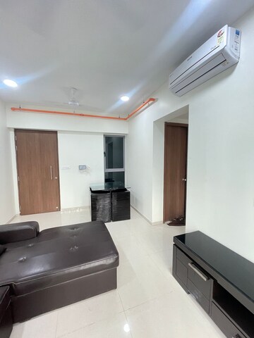 Living Room in 2 BHK Apartment at Kalpataru Immensa, Kolshet Road – for Rent