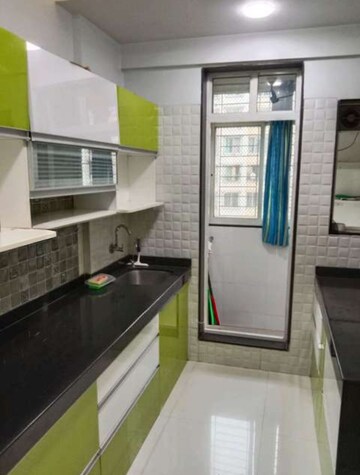 Kitchen in 2 BHK Apartment at Vasant Fiona, Pokhran Road No 2 – for Rent