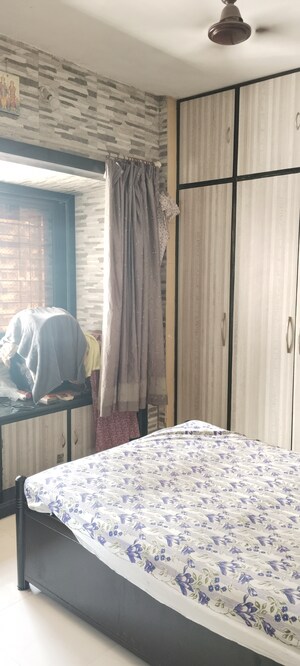 Bedroom in 1 BHK Apartment at Heritage Holy, Mulund West – for Sale