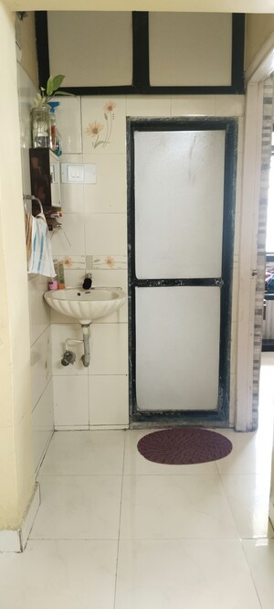Bathroom in 1 BHK Apartment at Heritage Holy, Mulund West – for Sale