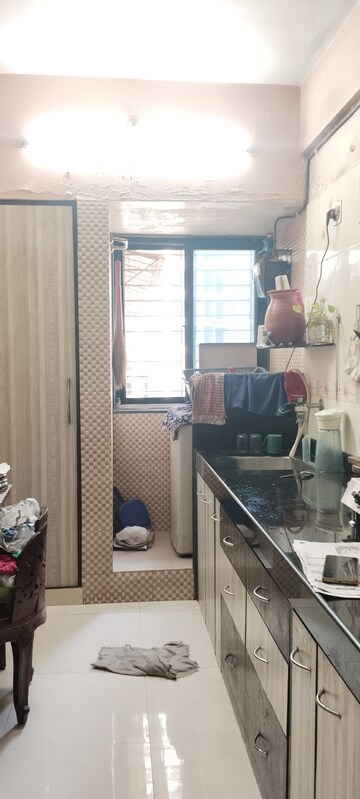 Master Bedroom in 1 BHK Apartment at Heritage Holy, Mulund West – for Sale