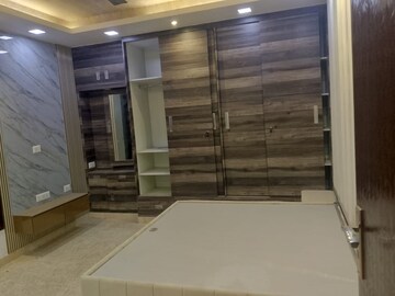 Bedroom in 4 BHK Builder Floor at Rajouri Garden – for Sale