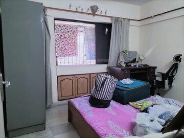 Bedroom in 2 BHK Apartment at Satellite Garden, Goregaon East – for Rent