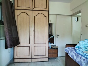 Bedroom in 2 BHK Apartment at Satellite Garden, Goregaon East – for Rent