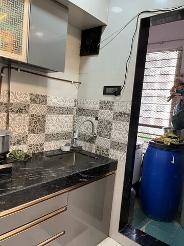 Kitchen in 1 BHK Builder Floor at Jamuna Tower, Mira Road – for Sale