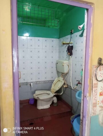 Bathroom in 2 BHK Apartment at Disha Apartment, Baguiati – for Sale
