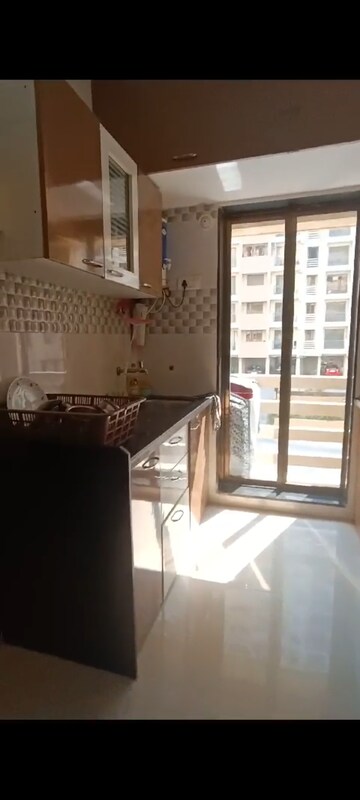 Kitchen in 2 BHK Apartment at Rustomjee Global City – for Rent