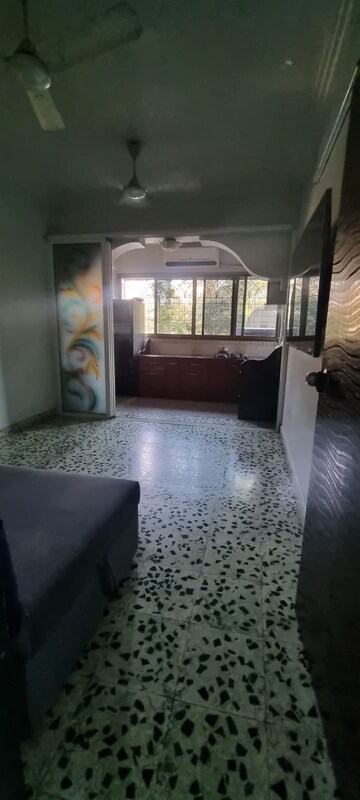 Living Room in 2 BHK Apartment at Bhavana CHS, Khopat – for Rent