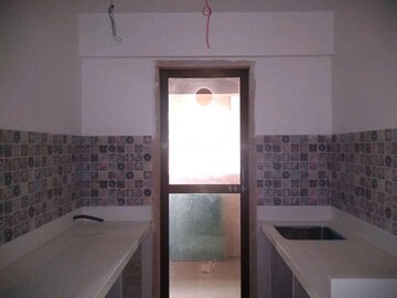 Kitchen in 1.5 BHK Apartment at Neumec Shreeji Towers, Wadala East – for Sale
