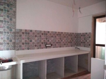 Kitchen in 1.5 BHK Apartment at Neumec Shreeji Towers, Wadala East – for Sale