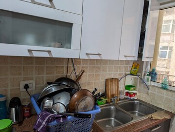Kitchen in 3 BHK Apartment at Mahagun Moderne, Sector 78 – for Rent