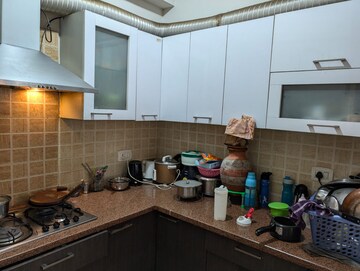 Kitchen in 3 BHK Apartment at Mahagun Moderne, Sector 78 – for Rent