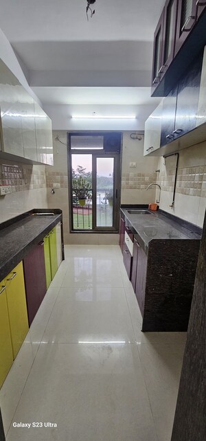 Kitchen in 1 BHK Apartment at Abrol Avirahi Heights, Malad West – for Sale