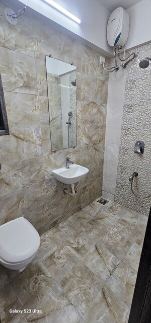 Bathroom in 1 BHK Apartment at Abrol Avirahi Heights, Malad West – for Sale