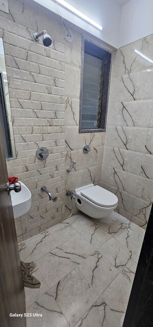 Bathroom in 1 BHK Apartment at Abrol Avirahi Heights, Malad West – for Sale