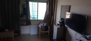 Living Room in 2 BHK Apartment at Magarpatta Nova Elegance, Mundhwa – for Sale