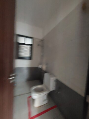Bathroom in 2 BHK Apartment at Nanded City Pancham, Nanded – for Sale