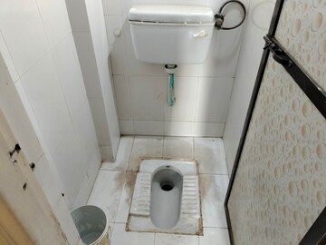 Bathroom in 1 BHK Apartment at Raunak Unnathi Woods, Ghodbunder Road – for Sale