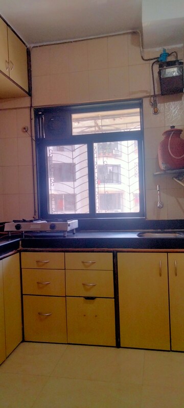 Kitchen in 2 BHK Apartment at Gokul Nagari 1, Kandivali East – for Rent