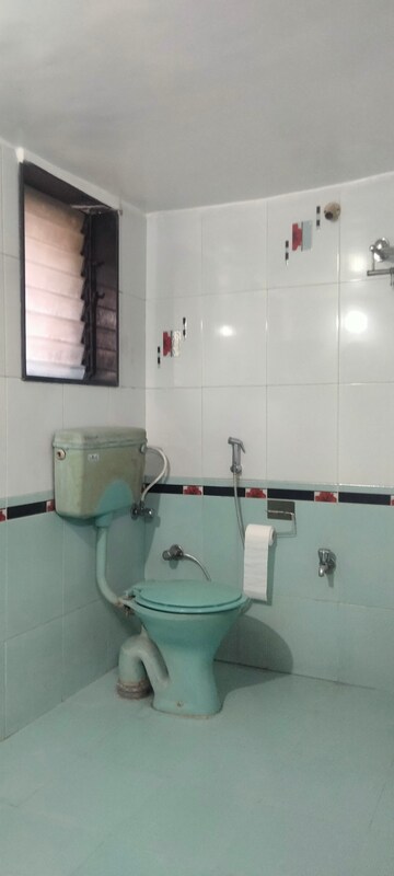 Bathroom in 2 BHK Apartment at Gokul Nagari 1, Kandivali East – for Rent