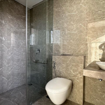 Bathroom in 3 BHK Apartment at Oberoi Sky City, Khande Rao Dongari – for Rent