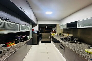 Kitchen in 3 BHK Apartment at Swati Chrysantha, Shela – for Rent