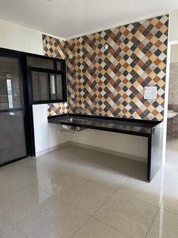 Kitchen in 3 BHK Apartment at Magarpatta Nanded City Sargam, Sinhagad – for Rent