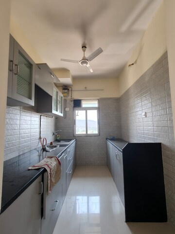 Kitchen in 2 BHK Apartment at Vihang Valley Phase 2, Kasarvadavali – for Rent