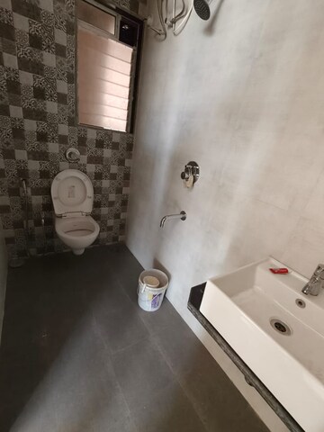Bathroom in 2 BHK Apartment at Vihang Valley Phase 2, Kasarvadavali – for Rent