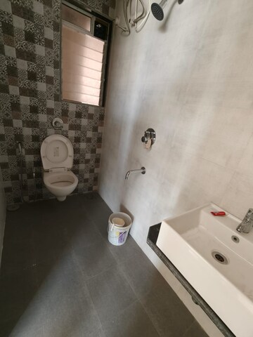 Bathroom in 2 BHK Apartment at Vihang Valley Phase 2, Kasarvadavali – for Rent