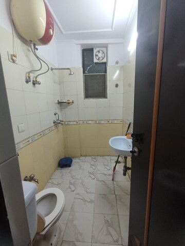 Bathroom in 2 BHK Apartment at Panchsheel Sps Heights, Ahinsa Khand ii – for Rent