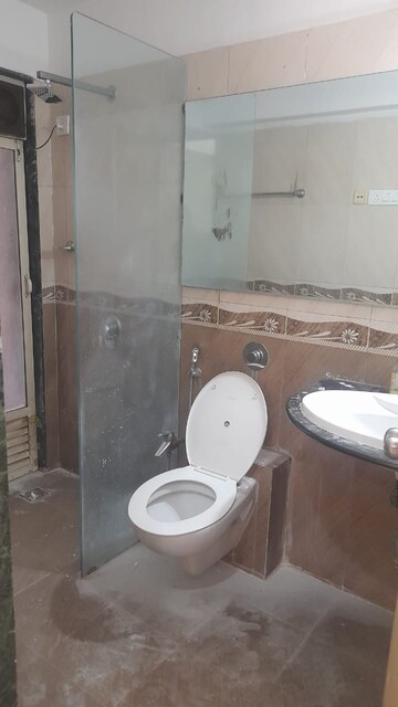 Bathroom in 2 BHK Apartment at Zinnia CHS, Powai – for Rent