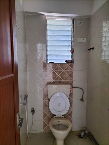 Bathroom in 2 BHK Apartment at Tanvi Eminence, Mira Road – for Sale