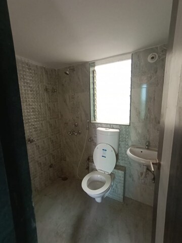 Bathroom in 2 BHK Apartment at Mohan Willows, Badlapur East – for Rent