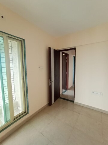 Room in 2 BHK Apartment at Mohan Willows, Badlapur East – for Rent