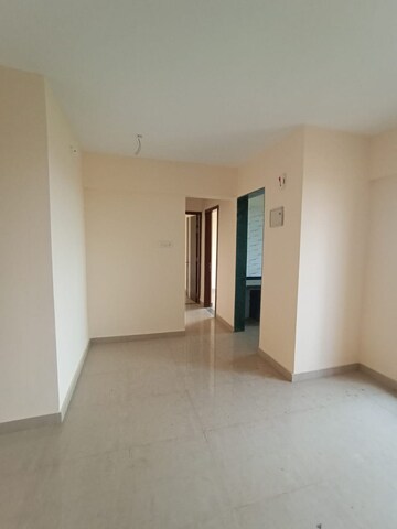 Room in 2 BHK Apartment at Mohan Willows, Badlapur East – for Rent