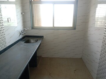 Kitchen in 2 BHK Apartment at Mohan Willows, Badlapur East – for Rent