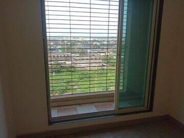Room in 2 BHK Apartment at Mohan Willows, Badlapur East – for Rent