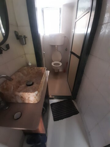 Bathroom in 1 BHK Apartment at Atharva CHS Charai, Charai – for Rent