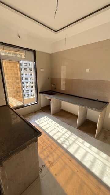 Kitchen in 2 BHK Apartment at Mangeshi Sohan, Khadakpada – for Sale