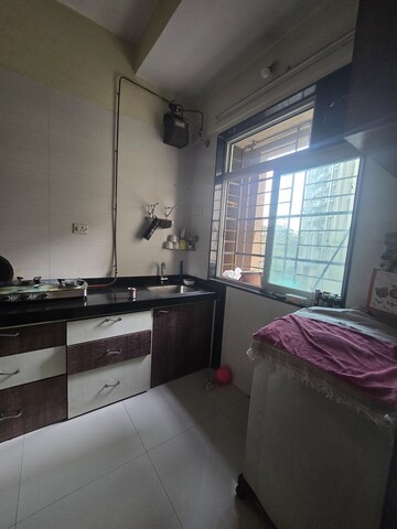 Kitchen in 1 BHK Apartment at Lodha Paradise, Majiwada – for Rent