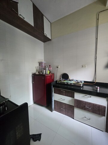 Kitchen in 1 BHK Apartment at Lodha Paradise, Majiwada – for Rent