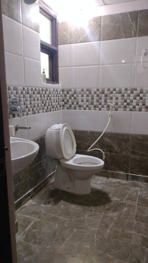 Bathroom in 2 BHK Apartment at Devika Skypers, Raj Nagar Extension – for Sale