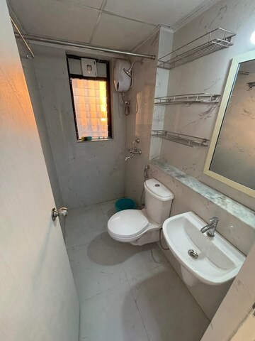 Bathroom in 2 BHK Apartment at Rustomjee Azziano Wing D, Majiwada – for Rent