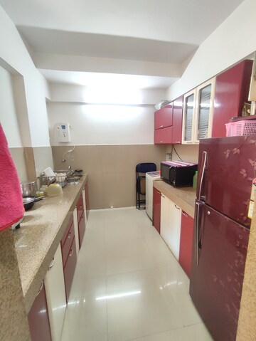 Kitchen in 1 BHK Apartment at Puranik Hometown Phase II, Ghodbunder Road – for Rent