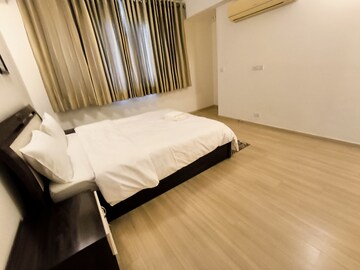Bedroom in 3 BHK Apartment at DLF Park Place, Sector 54 – for Rent