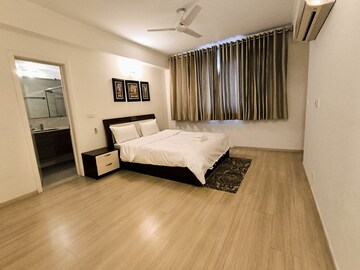 Bedroom in 3 BHK Apartment at DLF Park Place, Sector 54 – for Rent
