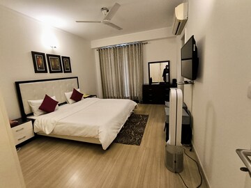 Bedroom in 3 BHK Apartment at DLF Park Place, Sector 54 – for Rent
