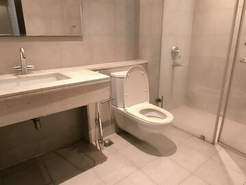 Bathroom in 4 BHK Apartment at Emaar The Palm Springs, Sector 54 – for Rent